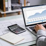 Construction cost planning process with a professional reviewing budgets and documents, emphasizing best practices in cost management
