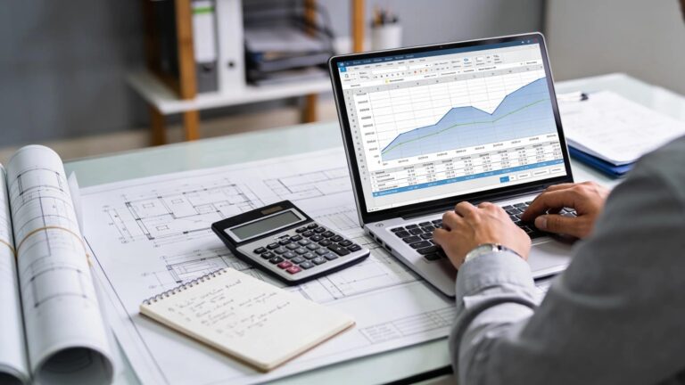 Construction cost planning process with a professional reviewing budgets and documents, emphasizing best practices in cost management